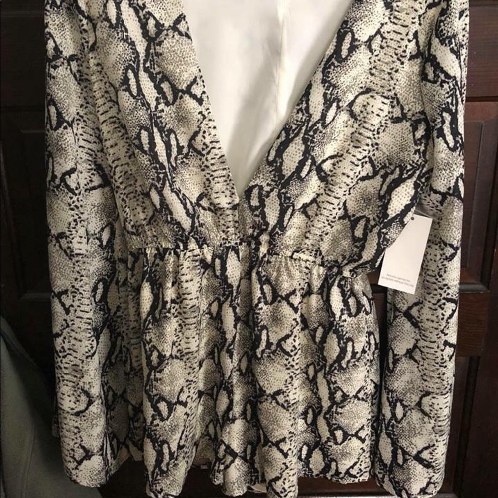 Tobi animal print romper size M